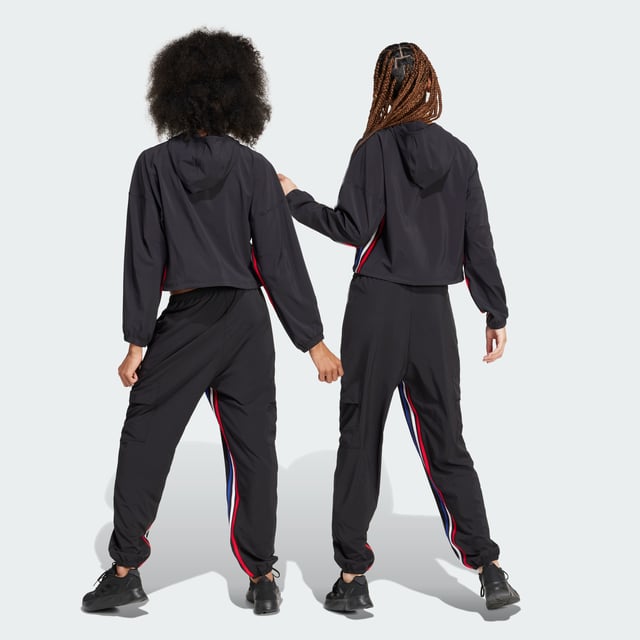 Express All Gender Breaking Cargo Pants Hit the streets with boundless confidence in these adidas pants. Designed for free movement, the stretchy woven fabric moves as you do, whether you're learning the latest dance trends, exploring the city or simply being yourself. AEROREADY technology helps keep you dry even as you push your limits. Cargo pockets carry the necessities while the partially lined interior offers extra comfort. Graphic 3-Stripes on the inseam let your style icon status be known. For those who forge their own path, these lightweight pants are your co-conspirator in self-expression.This product is made with at least 70% recycled materials. By reusing materials that have already been created, adidas help to reduce waste and our reliance on finite resources and reduce the footprint of the products adidas make. -