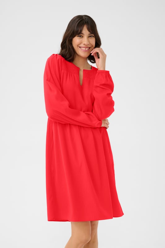 A-shape,Boven de knie,Lange mouwen  Wassen op 30°, niet bleken, niet in de droger drogen, Druipnat ophangen in de schaduw, warm strijken max. 150° C, Droogreiniging  100% Polyester