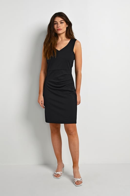 Slim fit,Boven de knie,Mouwloos  Fijne was 30°, niet bleken, niet in de droger drogen, Druipnat ophangen in de schaduw, koud strijken max. 110° C, Droogreiniging  80% Polyester,17% Viscose,3% Elastaan