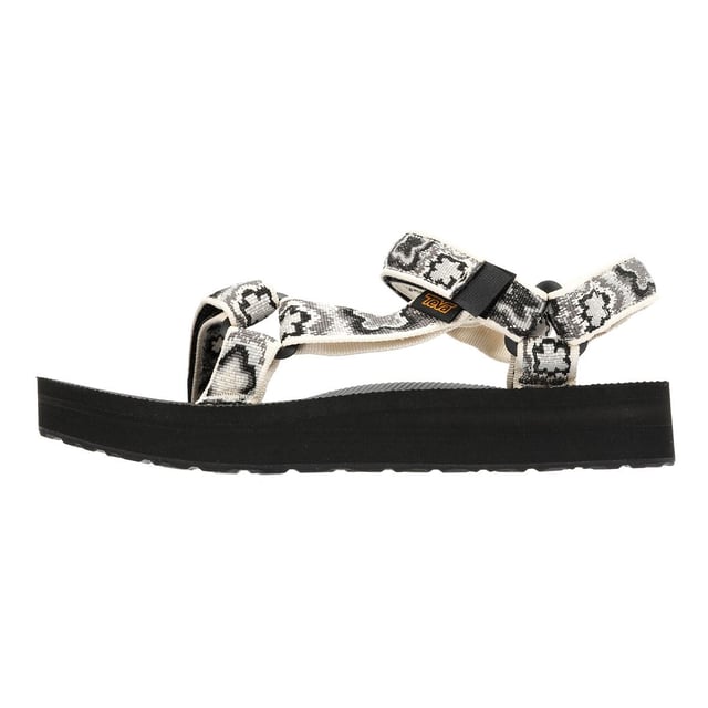 Der Midform Universal liegt genau zwischen dem Flatform Universal und dem Original Universal und erfreut Menschen. Das Obermaterial aus umweltfreundlichem Unifi® Repreve recyceltem Polyester-Webbing ist äußerst strapazierfähig und trocknet schnell nach dem Nasswerden. Das Universal-Befestigungssystem mit Klettverschluss sorgt für einen sicheren Sitz und ein schnelles An- und Ausziehen.
