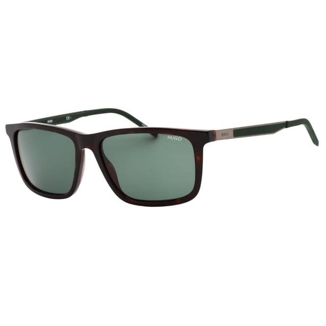 Elevate your style with the Hugo Boss Dark Havana Brown Sunglasses, featuring a sophisticated dark Havana frame paired with green lenses. These sunglasses offer a perfect blend of classic elegance and modern design, providing excellent UV protection while enhancing your visual clarity. Crafted for comfort and durability, they are ideal for daily wear or special occasions. Make a confident statement and protect your eyes with a timeless accessory that complements any outfit effortlessly. Experience the luxury and quality that Hugo Boss is renowned for with these stylish sunglasses. 56X16X145 100% Plastic