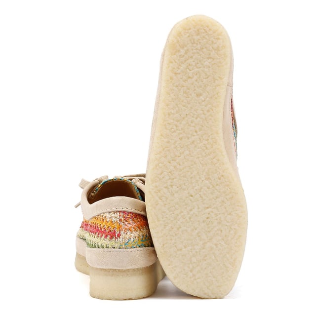 Moccasin style shoe featuring a multicolour crochet raffia upper for a handcrafted aesthetic. Designed with a natural pebble crepe sole for flexibility, natural flat laces, and a tonal suede rand for a refined finish.