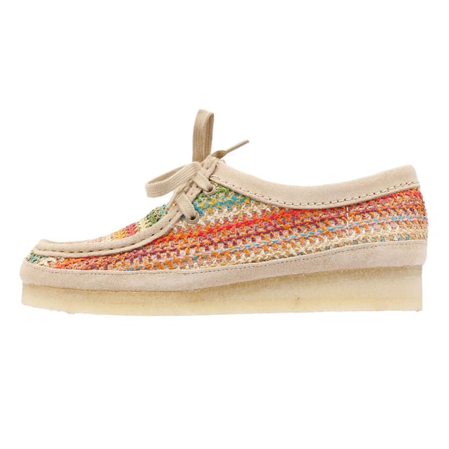 Moccasin style shoe featuring a multicolour crochet raffia upper for a handcrafted aesthetic. Designed with a natural pebble crepe sole for flexibility, natural flat laces, and a tonal suede rand for a refined finish.