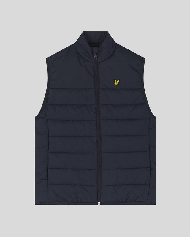 Our padded gilet for kids is just like our adult styles, only smaller. The versatile design features a funnel neck and a front zip fastening so they can wear it open or closed and our signature logo embroidery at the chest. From toddlers to teenagers, they’ll all love wearing this stylish outerwear. - Funnel neck - Front zip fastening- Zipped side pockets- Composition: 100% nylon