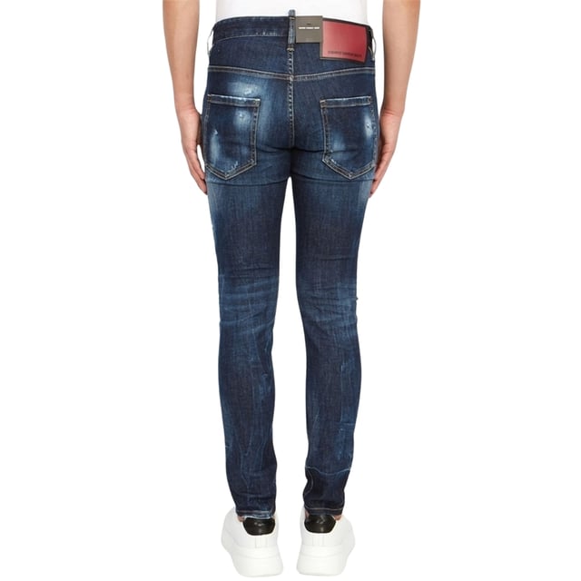 Estilo vaquero súper twinky, denim elástico 92 % algodón, 8 % elastano, bragueta de botones, corte ceñido con pernera cónica, detalle desgarrado. Hecho en Rumania, pantalones vaqueros azules.