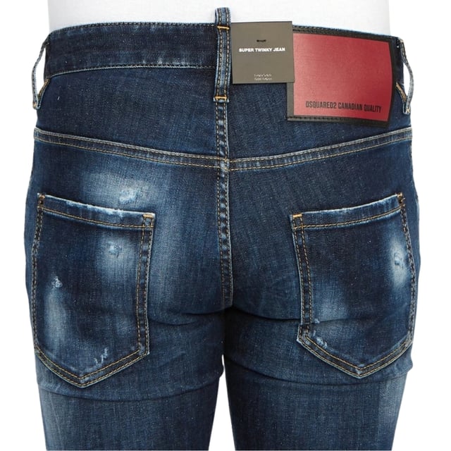 Estilo vaquero súper twinky, denim elástico 92 % algodón, 8 % elastano, bragueta de botones, corte ceñido con pernera cónica, detalle desgarrado. Hecho en Rumania, pantalones vaqueros azules.