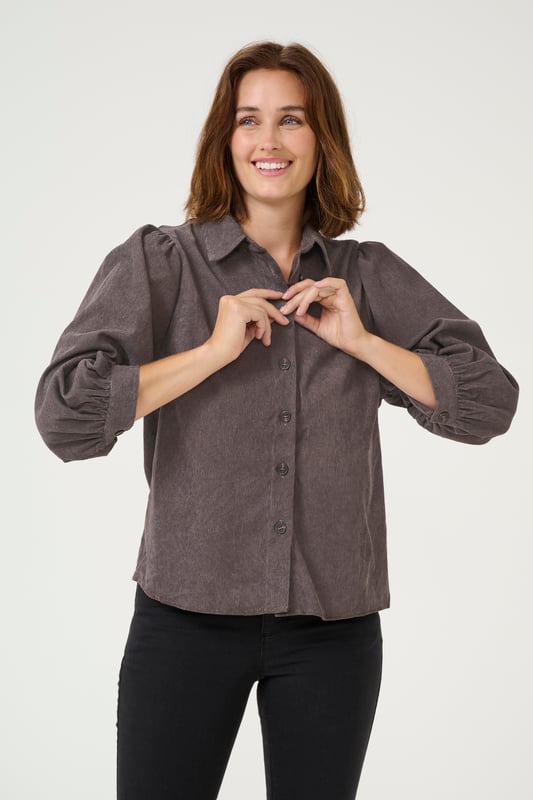 Regular fit,3/4 mouwen  Wassen op 30°, niet bleken, niet in de droger drogen, Druipnat ophangen in de schaduw, warm strijken max. 150° C, Droogreiniging  90% Polyester,8% Polyamide,2% Elastaan