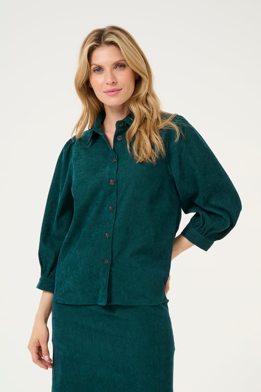 Regular fit,3/4 mouwen  Wassen op 30°, niet bleken, niet in de droger drogen, Druipnat ophangen in de schaduw, warm strijken max. 150° C, Droogreiniging  90% Polyester,8% Polyamide,2% Elastaan