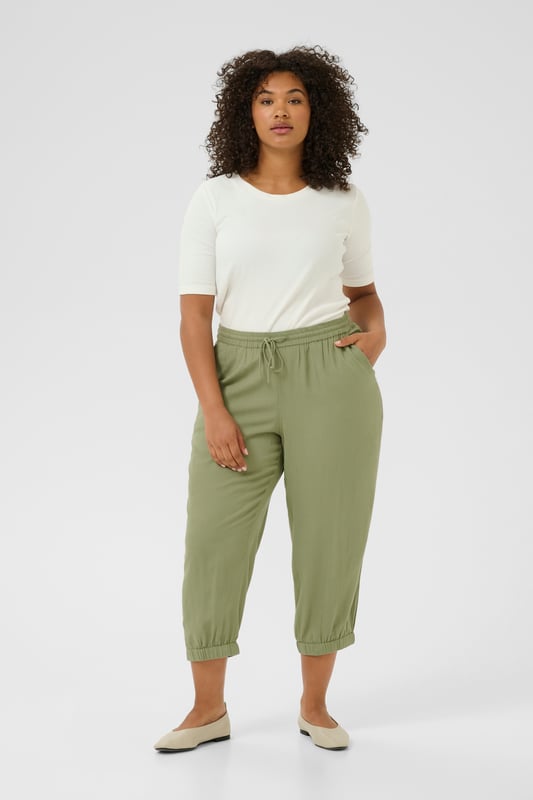 Model: , Pasform: Regular fit, Talje: Regular Waist, Længde: Mid calf  30 degrees gentle wash, do not bleach, do not tumble dry, Line drying in the shade, warm iron max. 150° C, Dry clean only  70% Viscose (LivaEco™),30% Linen