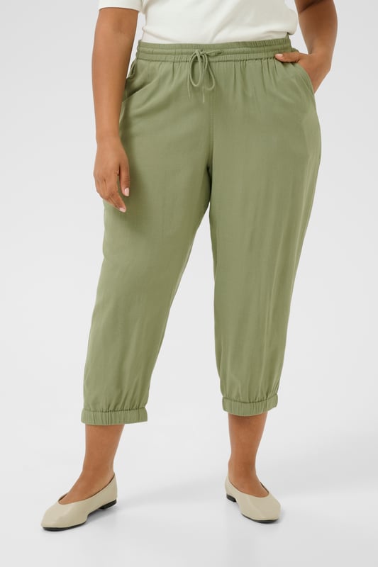 Model: , Pasform: Regular fit, Talje: Regular Waist, Længde: Mid calf  30 degrees gentle wash, do not bleach, do not tumble dry, Line drying in the shade, warm iron max. 150° C, Dry clean only  70% Viscose (LivaEco™),30% Linen