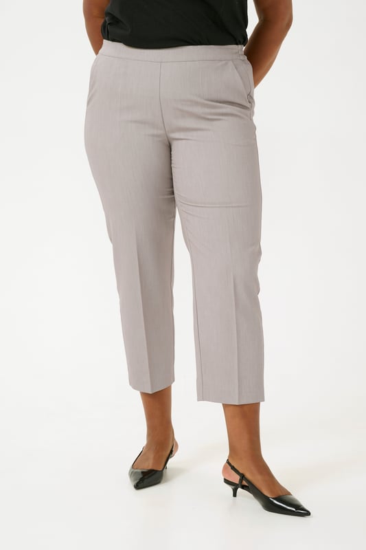 Regular fit,Elastische Taille,Knöchellänge,Gerade  30° waschbar, Nicht bleichen, Nicht im Trockner trocknen, Tropnass aufhängen im Schatten, Kalt bügeln max. 110° C, Trockenreinigung  77% Polyester (Recycelt),18% Viskose,5% Elasthan