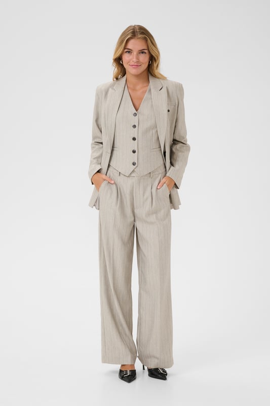 Regular fit,Hoge taille,Lange lengte,Relaxed  Fijne was 30°, niet bleken, niet in de droger drogen, Druipnat ophangen in de schaduw, koud strijken max. 110° C, Droogreiniging  88% Polyester,8% Viscose,4% Elastaan