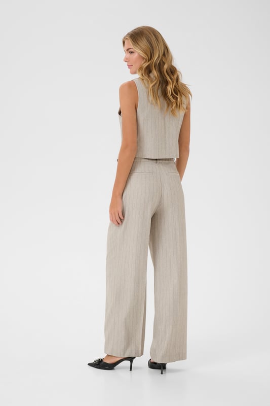 Regular fit,Hoge taille,Lange lengte,Relaxed  Fijne was 30°, niet bleken, niet in de droger drogen, Druipnat ophangen in de schaduw, koud strijken max. 110° C, Droogreiniging  88% Polyester,8% Viscose,4% Elastaan