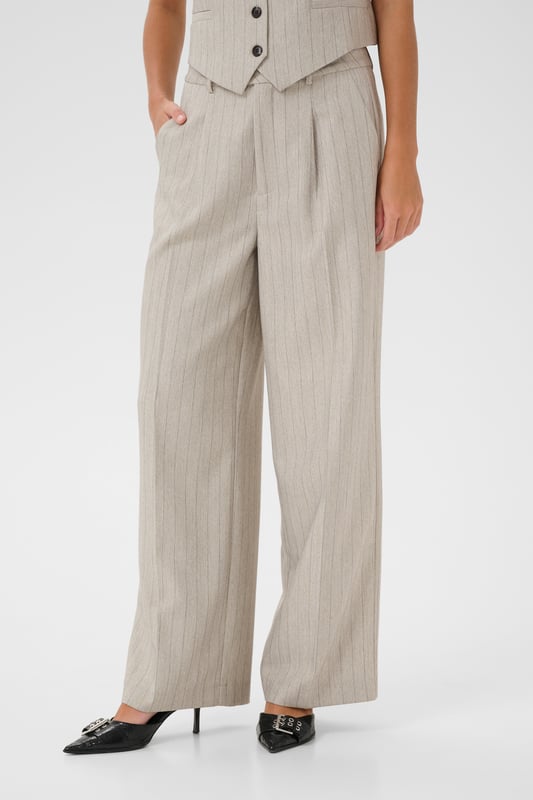 Regular fit,Hoge taille,Lange lengte,Relaxed  Fijne was 30°, niet bleken, niet in de droger drogen, Druipnat ophangen in de schaduw, koud strijken max. 110° C, Droogreiniging  88% Polyester,8% Viscose,4% Elastaan