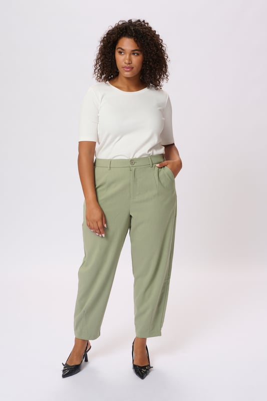 Loose fit,Elastische Taille,Knöchellänge,Tapered  30° waschbar, Nicht bleichen, Nicht im Trockner trocknen, Tropnass aufhängen im Schatten, Kalt bügeln max. 110° C, Trockenreinigung  64% Polyester (Recycelt),33% Viskose,3% Elasthan