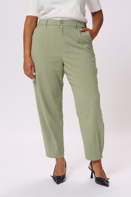 Loose fit,Elastische Taille,Knöchellänge,Tapered  30° waschbar, Nicht bleichen, Nicht im Trockner trocknen, Tropnass aufhängen im Schatten, Kalt bügeln max. 110° C, Trockenreinigung  64% Polyester (Recycelt),33% Viskose,3% Elasthan