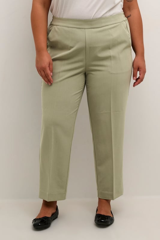 Regular fit,Elastische Taille,Knöchellänge,Gerade  30° waschbar, Nicht bleichen, Nicht im Trockner trocknen, Tropnass aufhängen im Schatten, Kalt bügeln max. 110° C, Trockenreinigung  77% Polyester (Recycelt),18% Viskose,5% Elasthan