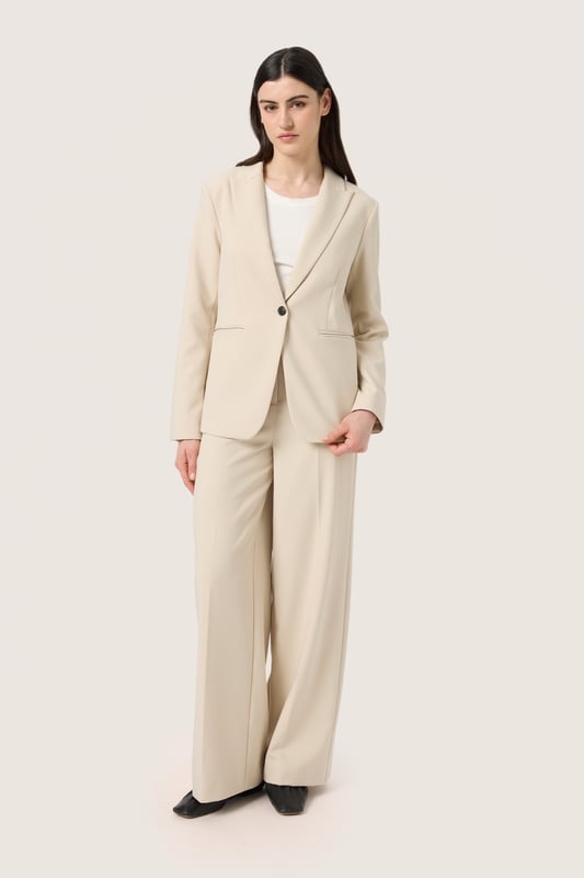 Regular fit,Lange lengte,Relaxed  Fijne was 30°, niet bleken, niet in de droger drogen, Druipnat ophangen in de schaduw, koud strijken max. 110° C, Droogreiniging  78% Polyester,18% Viscose,4% Elastaan