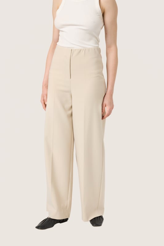 Regular fit,Lange lengte,Relaxed  Fijne was 30°, niet bleken, niet in de droger drogen, Druipnat ophangen in de schaduw, koud strijken max. 110° C, Droogreiniging  78% Polyester,18% Viscose,4% Elastaan