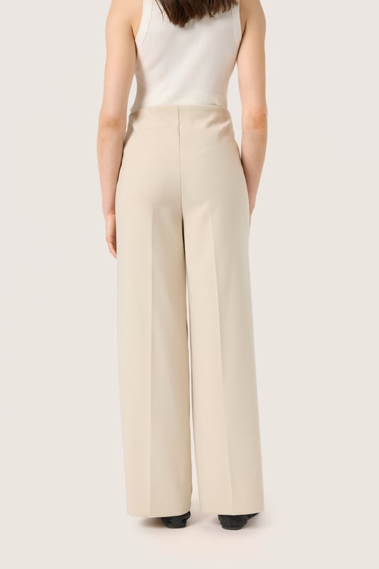 Regular fit,Lange lengte,Relaxed  Fijne was 30°, niet bleken, niet in de droger drogen, Druipnat ophangen in de schaduw, koud strijken max. 110° C, Droogreiniging  78% Polyester,18% Viscose,4% Elastaan