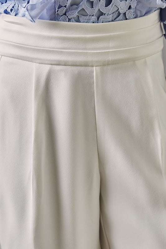 Elegant straight leg trousers with distinctive side panel detailing for a refined silhouette
        Sophisticated high waistband with smooth front pleating for a flattering fit
        Crafted from lightweight crepe fabric offering comfortable movement for all-day wear
        Clean-lined design with subtle side panels that create visual interest and elongate the leg
        Versatile straight cut that pairs beautifully with both fitted and flowing tops
    
    These sophisticated Side Panel Straight Leg Trousers from Coast offer the perfect foundation for your occasion wardrobe. The elegant straight silhouette with distinctive side panel detailing creates a refined look that transitions effortlessly from day to evening events. Style with the textured blue blouse as shown for a coordinated ensemble that commands attention at summer weddings or race day events. For evening occasions, pair with a silk camisole and structured blazer, adding metallic heeled sandals and a clutch bag for a polished finish. The high waistband and front pleating flatter your figure while the straight leg cut offers timeless appeal that works beautifully for formal gatherings. These trousers strike the perfect balance between contemporary design and classic elegance-a true wardrobe investment for the discerning woman.