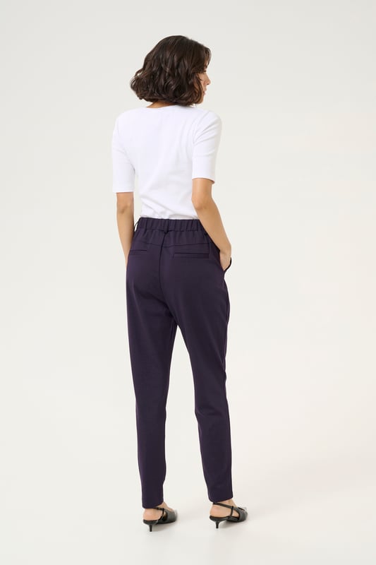 Regular fit,Elastische Taille,Lang,Slim  30° waschbar, Nicht bleichen, Nicht im Trockner trocknen, Tropnass aufhängen im Schatten, Kalt bügeln max. 110° C, Trockenreinigung  76% Polyester (Recycelt),20% Viskose,4% Elasthan