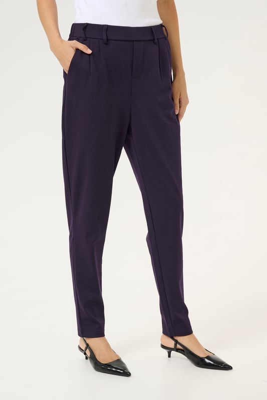 Regular fit,Elastische Taille,Lang,Slim  30° waschbar, Nicht bleichen, Nicht im Trockner trocknen, Tropnass aufhängen im Schatten, Kalt bügeln max. 110° C, Trockenreinigung  76% Polyester (Recycelt),20% Viskose,4% Elasthan
