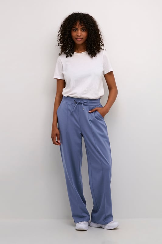 Regular fit,Elastische taille,Lange lengte,Relaxed  Wassen op 30°, niet bleken, niet in de droger drogen, Druipnat ophangen in de schaduw, koud strijken max. 110° C, Droogreiniging  76% Polyester (Gerecycled),20% Viscose,4% Elastaan