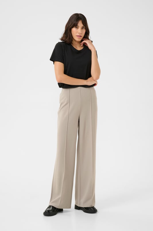 Slim fit,Elastische taille,Lange lengte,Straight  Fijne was 30°, niet bleken, niet in de droger drogen, Druipnat ophangen in de schaduw, koud strijken max. 110° C, Droogreiniging  96% Polyester,4% Elastaan