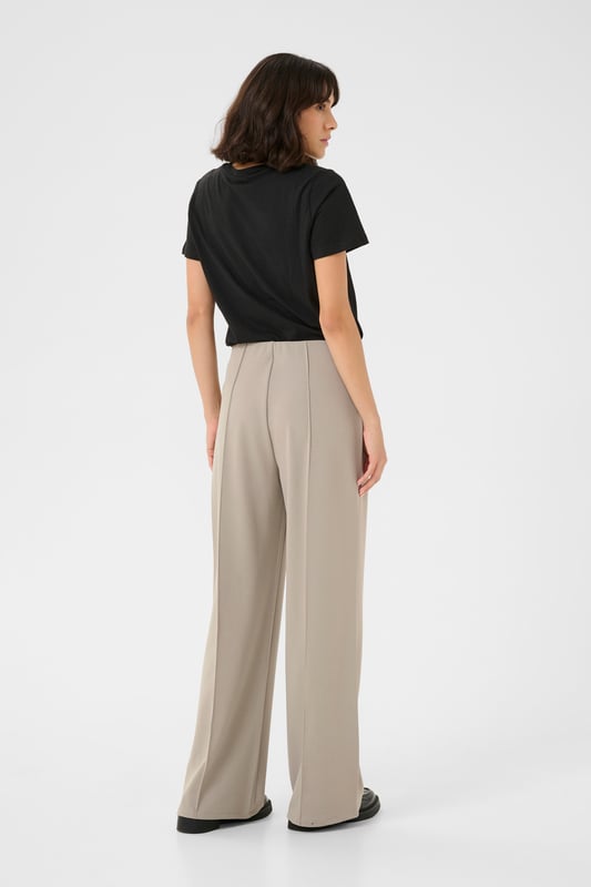 Slim fit,Elastische taille,Lange lengte,Straight  Fijne was 30°, niet bleken, niet in de droger drogen, Druipnat ophangen in de schaduw, koud strijken max. 110° C, Droogreiniging  96% Polyester,4% Elastaan