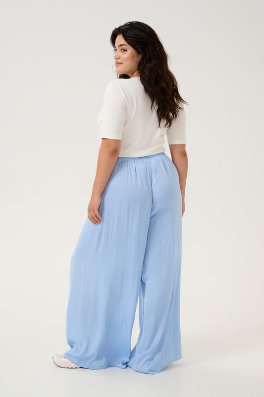 Loose fit,Elastische Taille,Lang,Weite leg  30° waschbar, Nicht bleichen, Nicht im Trockner trocknen, Tropnass aufhängen im Schatten, Warm bügeln max. 150° C, Trockenreinigung  100% Polyester