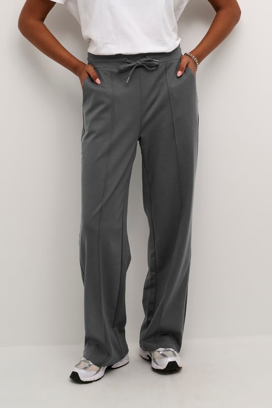 Regular fit,Elastische Taille,Lang,Weite leg  30° waschbar, Nicht bleichen, Nicht im Trockner trocknen, Tropnass aufhängen im Schatten, Kalt bügeln max. 110° C, Trockenreinigung  76% Polyester (Recycelt),20% Viskose,4% Elasthan
