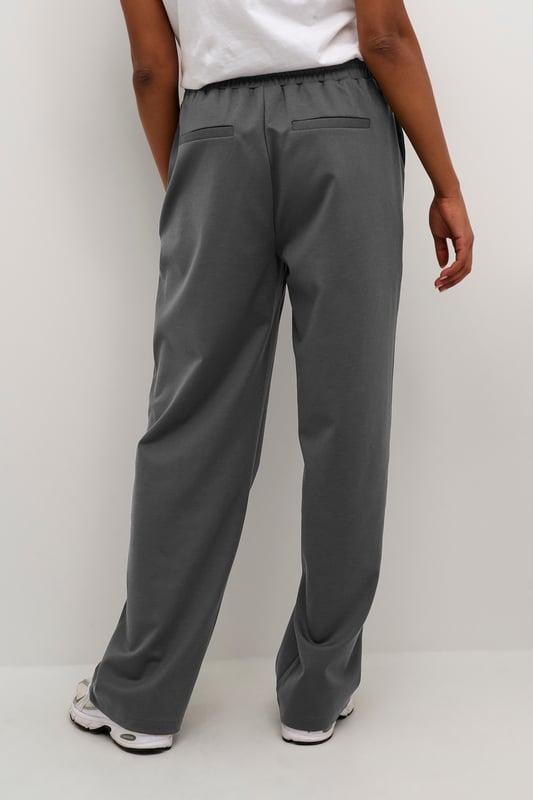 Regular fit,Elastische Taille,Lang,Weite leg  30° waschbar, Nicht bleichen, Nicht im Trockner trocknen, Tropnass aufhängen im Schatten, Kalt bügeln max. 110° C, Trockenreinigung  76% Polyester (Recycelt),20% Viskose,4% Elasthan