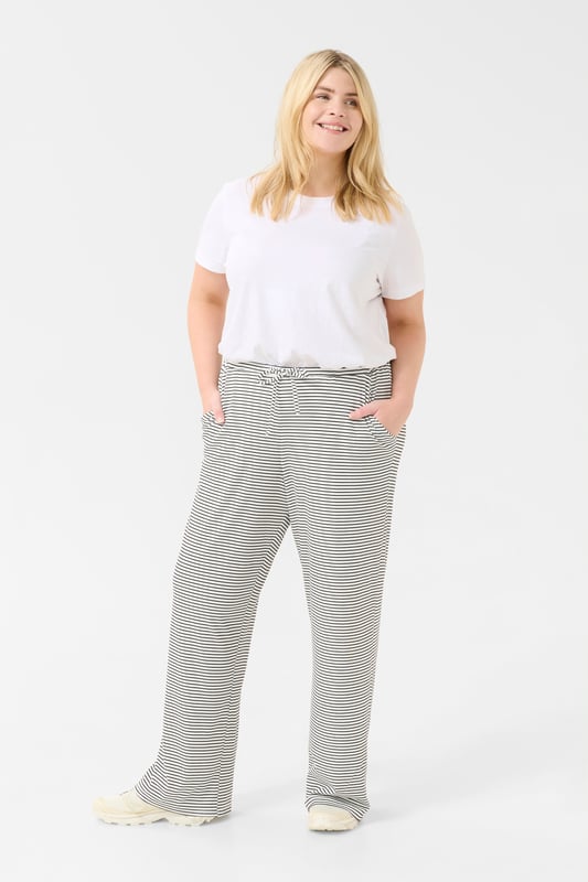 Loose fit,Elastische taille,Lange lengte  Wassen op 30°, niet bleken, niet in de droger drogen, Druipnat ophangen in de schaduw, warm strijken max. 150° C, Droogreiniging  97% Polyester,3% Elastaan