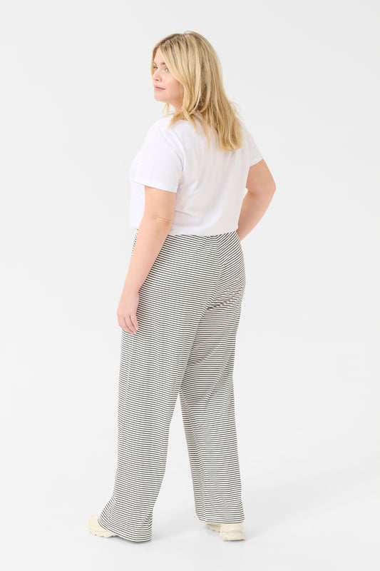 Loose fit,Elastische taille,Lange lengte  Wassen op 30°, niet bleken, niet in de droger drogen, Druipnat ophangen in de schaduw, warm strijken max. 150° C, Droogreiniging  97% Polyester,3% Elastaan