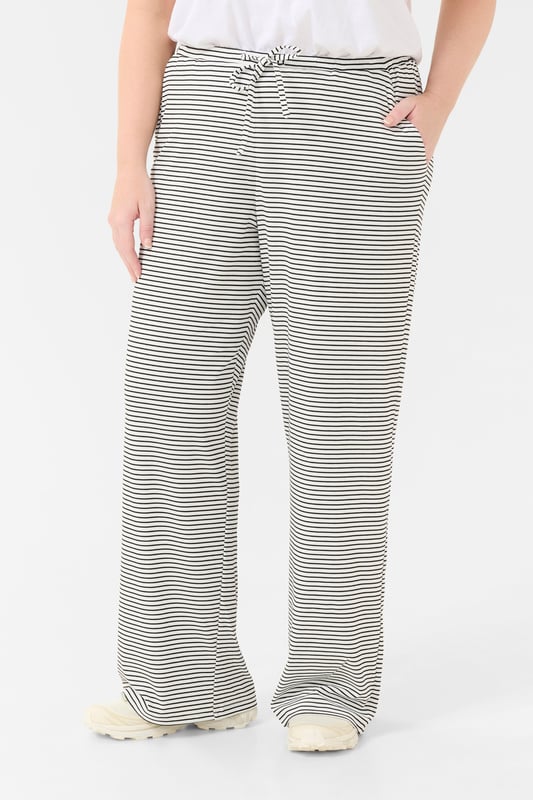 Loose fit,Elastische taille,Lange lengte  Wassen op 30°, niet bleken, niet in de droger drogen, Druipnat ophangen in de schaduw, warm strijken max. 150° C, Droogreiniging  97% Polyester,3% Elastaan