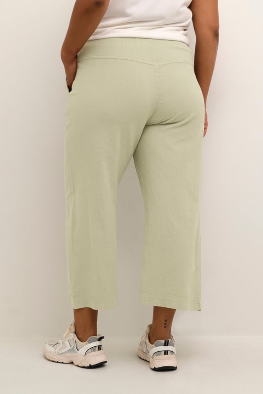 Loose fit,Elastische taille,Cropped lengte,Relaxed  Wassen op 30°, niet bleken, drogen in droger behoedzaam, Druipnat ophangen in de schaduw, warm strijken max. 150° C, Droogreiniging  100% Katoen