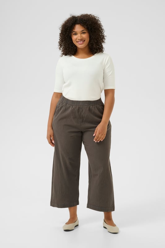 Loose fit,Elastische taille,Cropped lengte,Relaxed  Wassen op 30°, niet bleken, drogen in droger behoedzaam, Druipnat ophangen in de schaduw, warm strijken max. 150° C, Droogreiniging  100% Katoen
