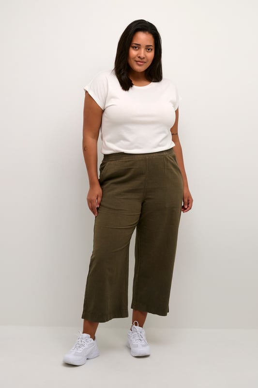 Loose fit,Elastische Taille,Knöchellänge,Weite leg  30° waschbar, Nicht bleichen, Trocknen im Trockner schonend, Tropnass aufhängen im Schatten, Warm bügeln max. 150° C, Trockenreinigung  100% Baumwolle