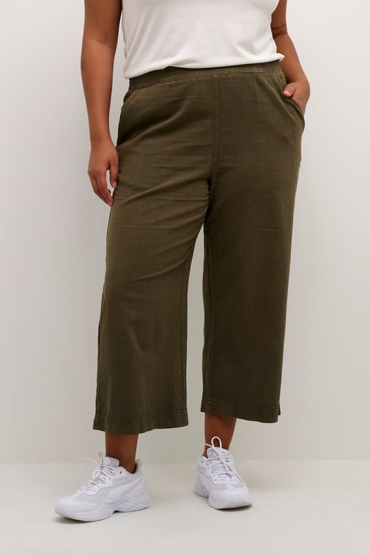 Loose fit,Elastische Taille,Knöchellänge,Weite leg  30° waschbar, Nicht bleichen, Trocknen im Trockner schonend, Tropnass aufhängen im Schatten, Warm bügeln max. 150° C, Trockenreinigung  100% Baumwolle