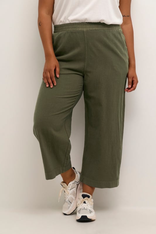Loose fit,Elastische Taille,Knöchellänge,Weite leg  30° waschbar, Nicht bleichen, Trocknen im Trockner schonend, Tropnass aufhängen im Schatten, Warm bügeln max. 150° C, Trockenreinigung  100% Baumwolle