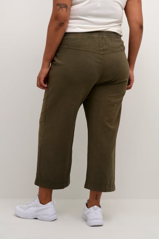 Loose fit,Elastische Taille,Knöchellänge,Weite leg  30° waschbar, Nicht bleichen, Trocknen im Trockner schonend, Tropnass aufhängen im Schatten, Warm bügeln max. 150° C, Trockenreinigung  100% Baumwolle