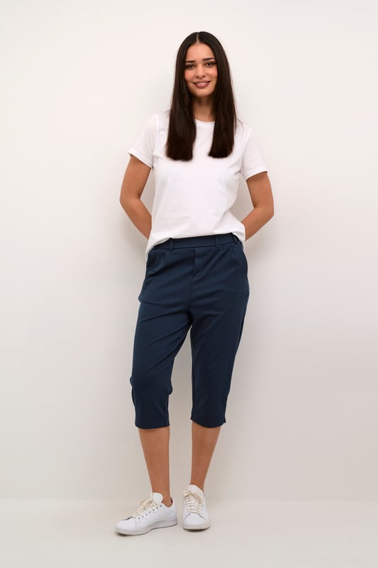 Regular fit,Elastische taille,Onder de knie,Slim  Wassen op 30°, niet bleken, niet in de droger drogen, Druipnat ophangen in de schaduw, koud strijken max. 110° C, Droogreiniging  76% Polyester (Gerecycled),20% Viscose,4% Elastaan