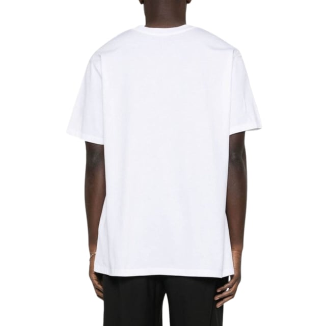 Elevate your wardrobe with the Balmain Paris Bold Brand Logo White T-Shirt, a statement piece that combines luxury and casual style effortlessly. Crafted from premium, soft cotton, this t-shirt ensures all-day comfort while showcasing the iconic Balmain logo boldly across the chest. Its crisp white colour offers versatile pairing options, making it perfect for both relaxed weekends and stylish outings. Designed for those who appreciate high fashion with a modern edge, this t-shirt adds a touch of Parisian sophistication to any outfit. Invest in timeless quality and standout style with this essential Balmain piece. 100% Cotton. Made In Italy. AH1EF000BB29 GAB