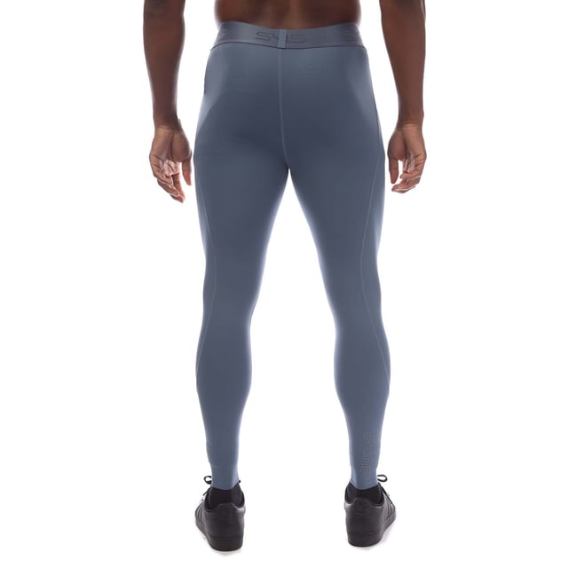 Mens Skins Series-2 Long Tights in blue.- Branded elasticated waistband.- Reflective outline logos.- Squat proof.- Great absorbency and wicking qualities.- 83% Polyester  17% Elastane.- Ref: SW00200010575