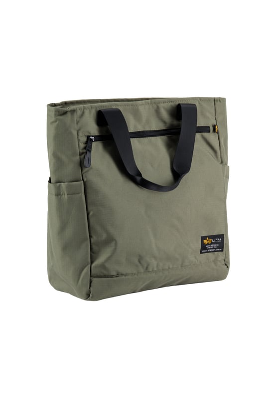 Alpha Backpack Tote Bag La Alpha Backpack Tote Bag combina funcionalidad y estilo. Su resistente exterior de poliéster es ligero y fácil de cuidar, ideal para el trabajo, la universidad o el tiempo libre. Ofrece un amplio espacio para el portátil y mucho más. Las asas de mano tejidas y las correas de hombro ajustables permiten llevarla como bolso o como mochila. Su diseño discreto combina con cualquier conjunto, y su construcción robusta garantiza durabilidad. Práctica, moderna y elegante: el estilo Alpha Industries en estado puro.
