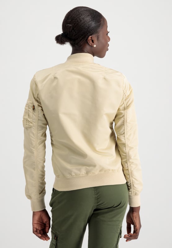 The MA-1 VF LW bomber jacket for women is a slim-fit jacket with a shiny zipper and a pen pocket. This stylish jacket is perfect for any occasion, whether you want to dress up or keep it casual.