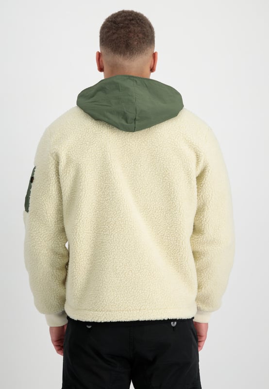 Teddy Nylon Zip Hood Bomber Jacket The Teddy Nylon ZH Jacket by ALPHA INDUSTRIES is a bomber jacket for men with a regular fit. The jacket is lightly lined and has side pockets and a zip fastening. With its stylish design, it is the perfect companion for everyday wear.
