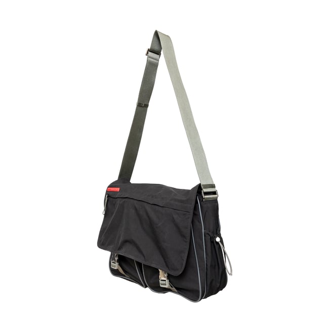 VINTAGE, RRP AS NEW
This sporty messenger bag from Prada features silver-tone hardware, an adjustable shoulder strap, three exterior pockets, nylon lining, and dual buckle closure at the front. Measurments:  width: 965 mm height: 812 mm