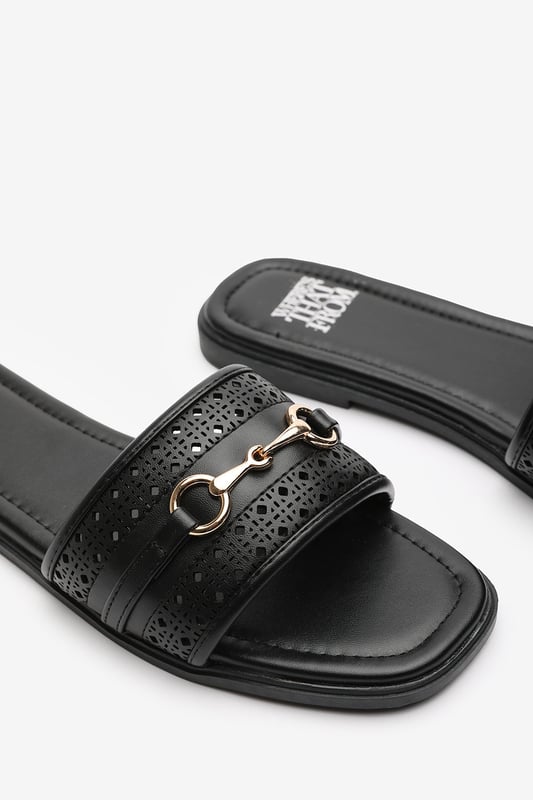 Wheres That From Womens 'Natalie' Sliders With Geometric Strap And Metal Detail Step into timeless elegance with these Natalie Sliders With Geometric Strap And Metal Detail. Designed with a chic metallic horse-bit buckle, they effortlessly blend sophistication and comfort. The perforated upper adds breathable style, while the slip-on design makes them ideal for effortless wear from day to night. Perfect for holidays, casual brunches, or a polished everyday look. Key Features: • Material: Faux leather upper with a cushioned insole for all-day comfort • Design: Perforated detailing with a stylish horse-bit buckle accent • Closure: Easy slip-on style for convenience